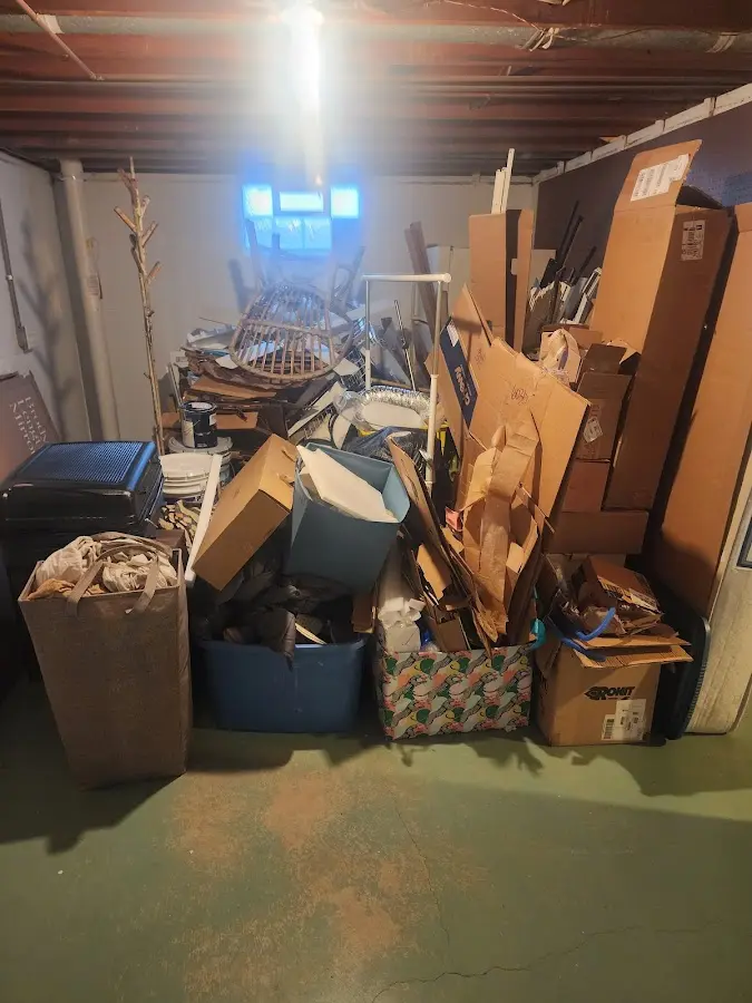 Roll-off dumpster container at job site for 6 Yard Dumpster Rental in Frontenac